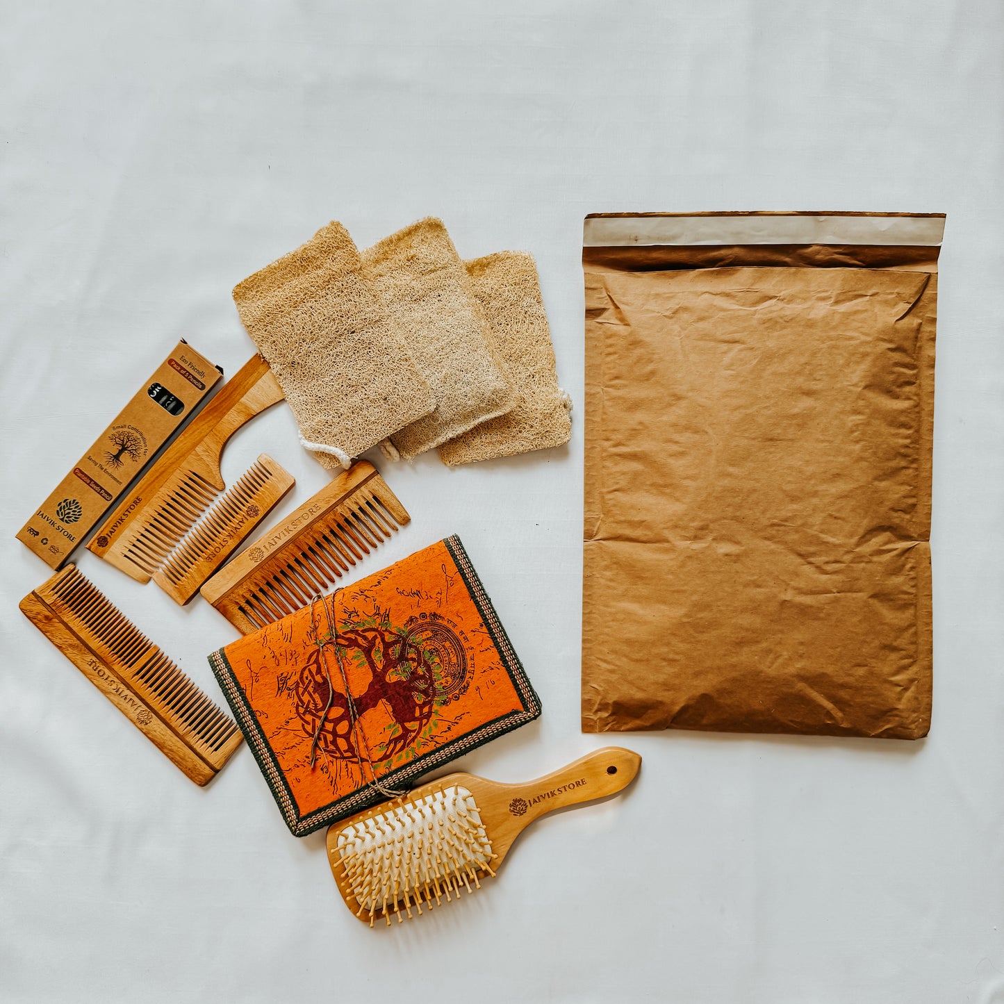 Jaivik Store EcoArmor shockproof paper mailer with packed item displayed outside, showing secure and recyclable design
