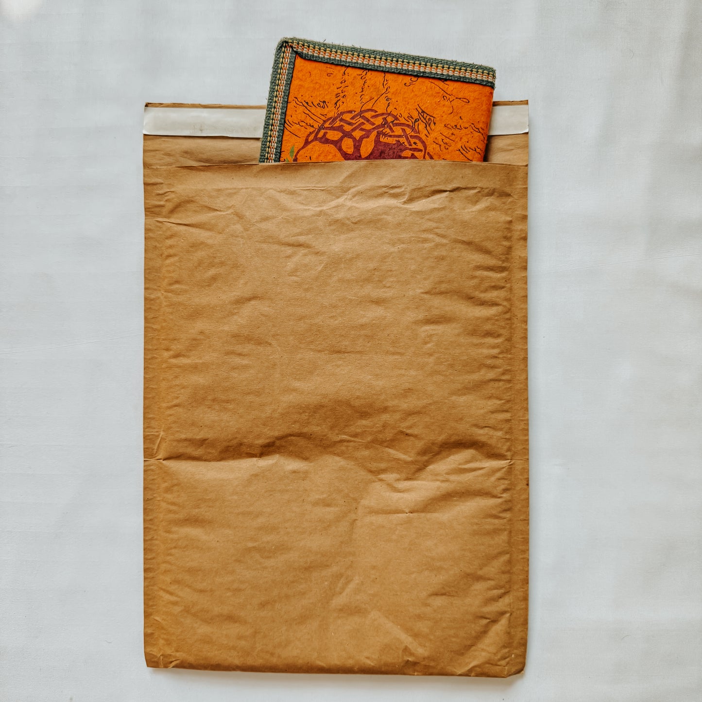 Jaivik Store EcoArmor shockproof paper mailer pack of 10, securely packed with a diary for safe shipping