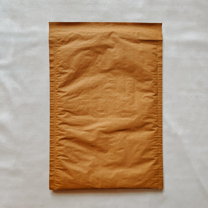 Front view of Jaivik Store EcoArmor shockproof paper mailer pack of 10, sustainable protective packaging