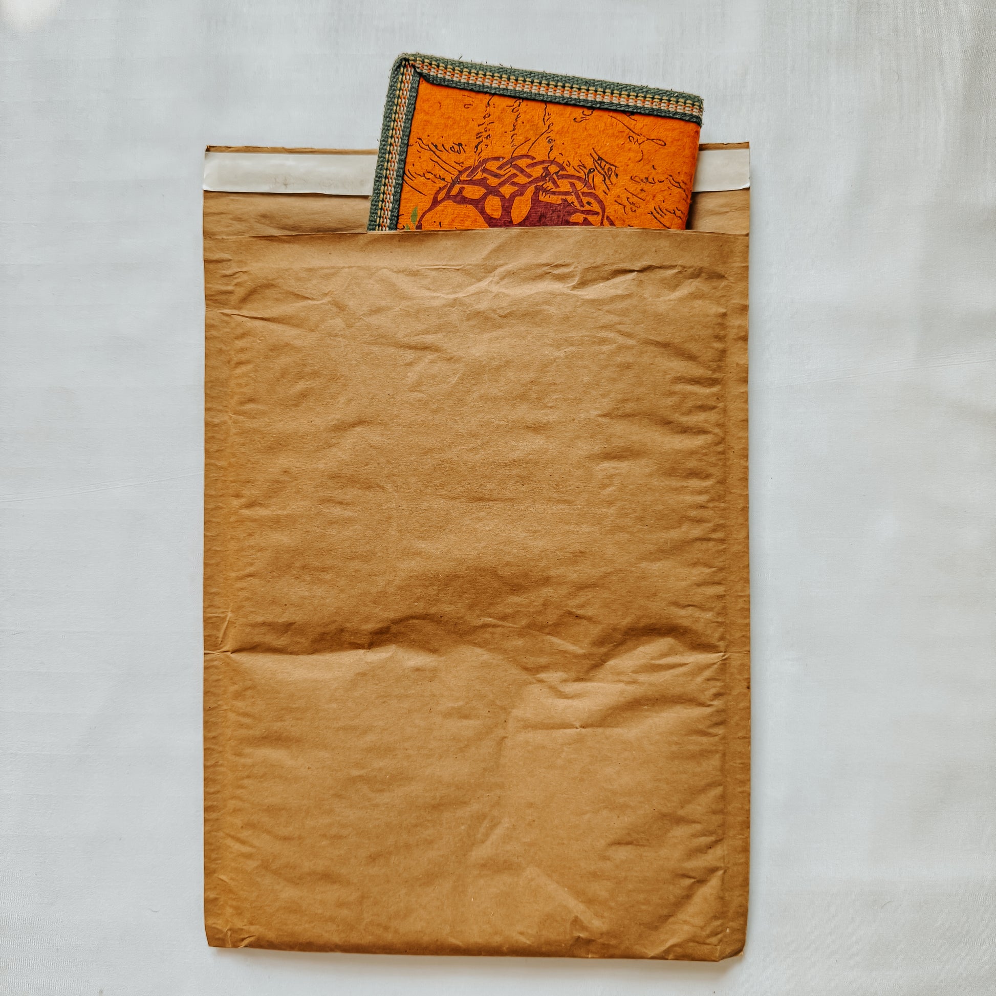 Jaivik Store EcoArmor shockproof paper mailer pack of 10, securely packed with a diary for safe shipping